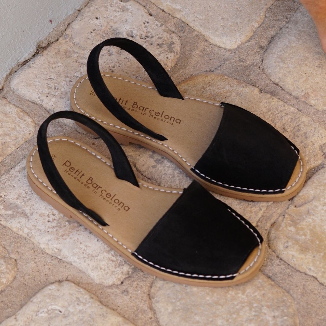 Petit Barcelona Black Flat Avarca Leather Sandals featuring a padded footbed for cushioned support